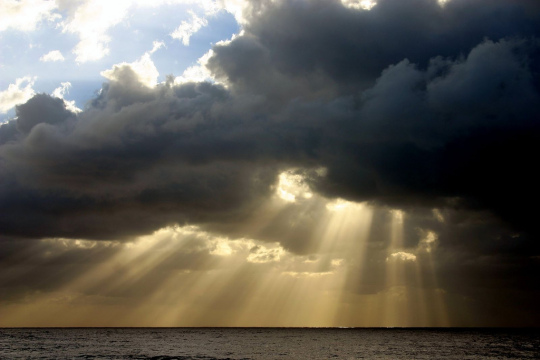 sun-rays-through-dark-clouds.jpg
